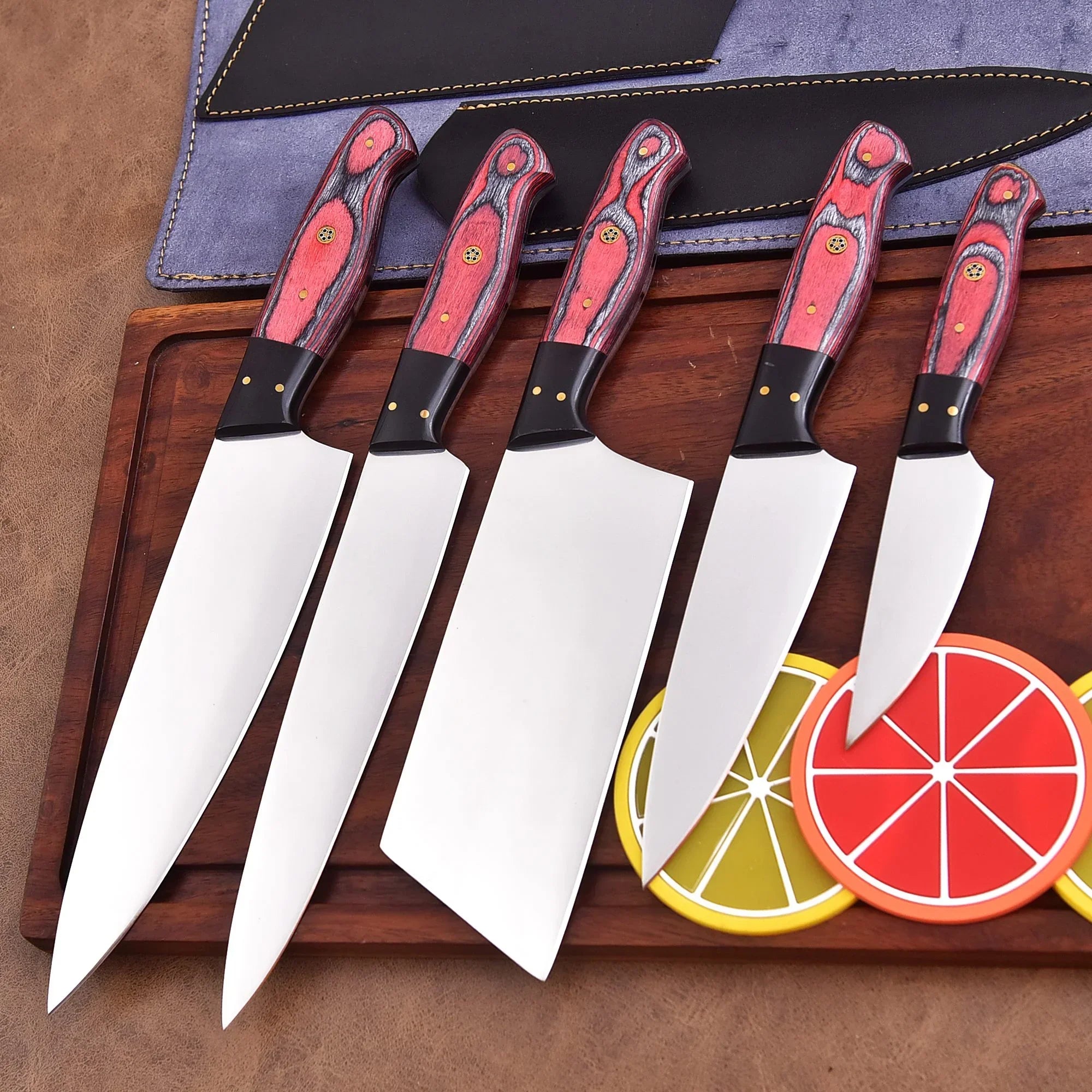 Inferna Veil Damascus steel chef knife set with red resin and black wood handles by Shard Blade