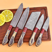 High-quality image of 5 pieces handmade damascus steel knife chef set with rose wood bolster, distressed wood handle and leather roll