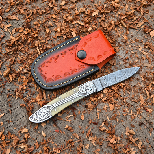 Ivorybill – Hand Forged Damascus Pocket Knife with Engraved Bolster, Bone Handle & Leather Sheath