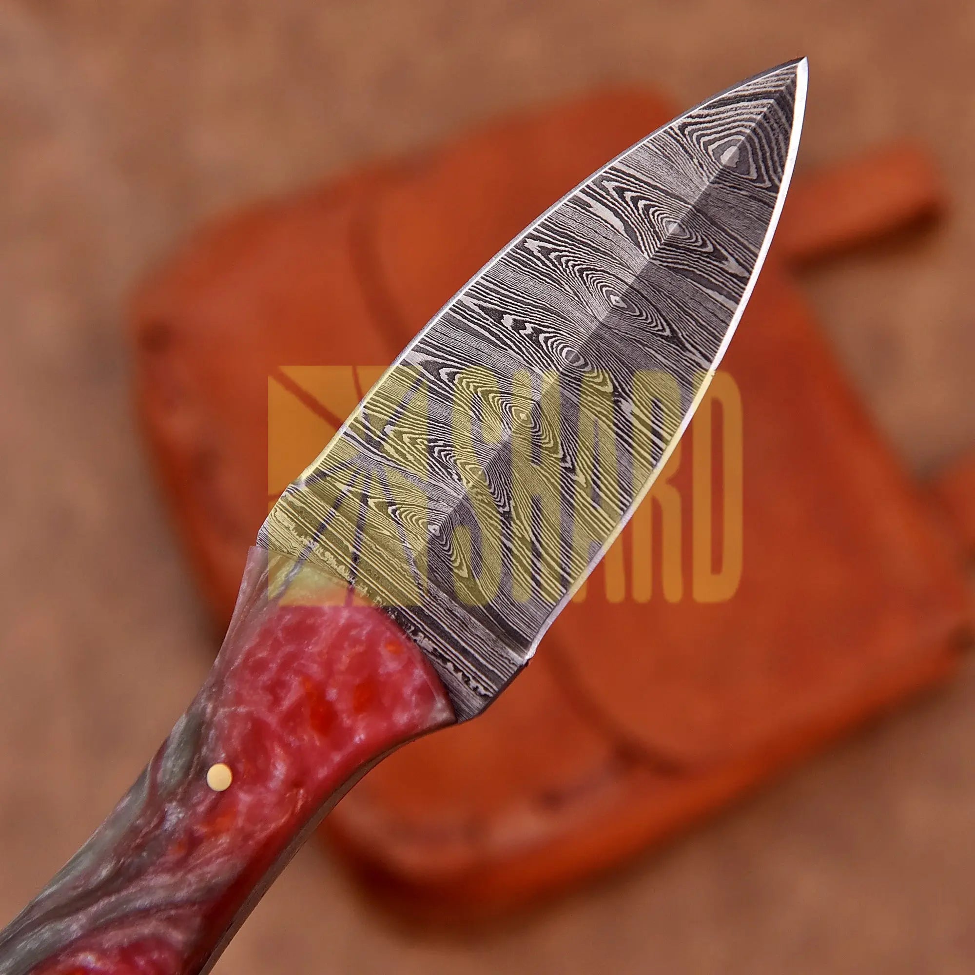 Hand-forged Damascus steel collectible with raindrop pattern and ruby red mixed resin handle – Eternal Raindrop gift piece