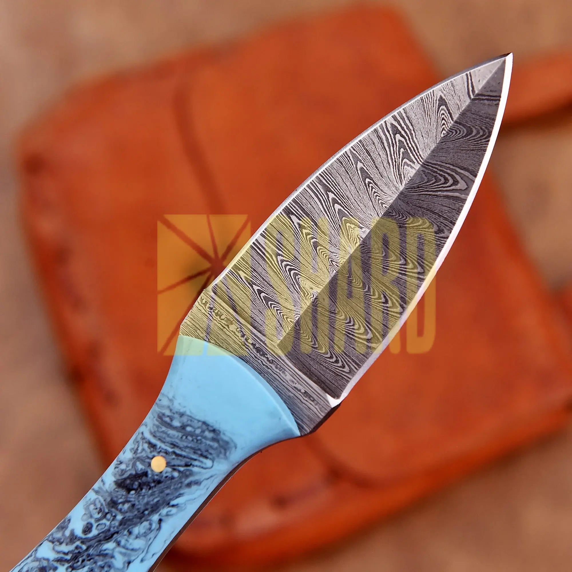 Hand-forged Damascus steel collectible with raindrop pattern and light blue resin handle – Eternal Raindrop gift piece