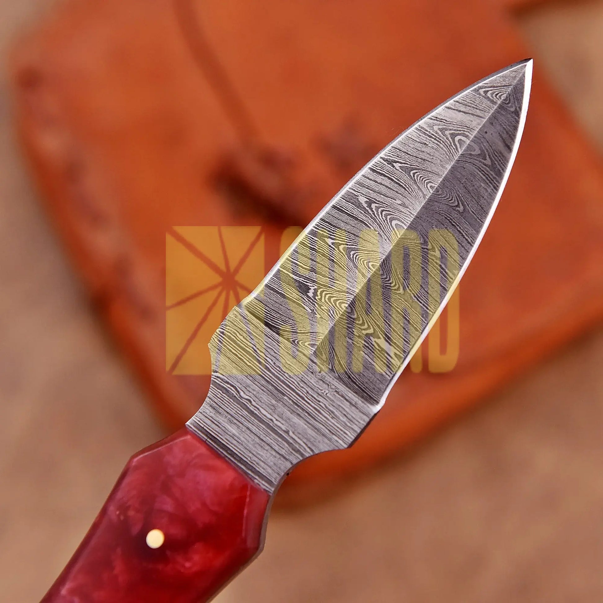 Hand-forged Damascus steel collectible with raindrop pattern and red ruby resin handle – Raindrop Trail gift piece