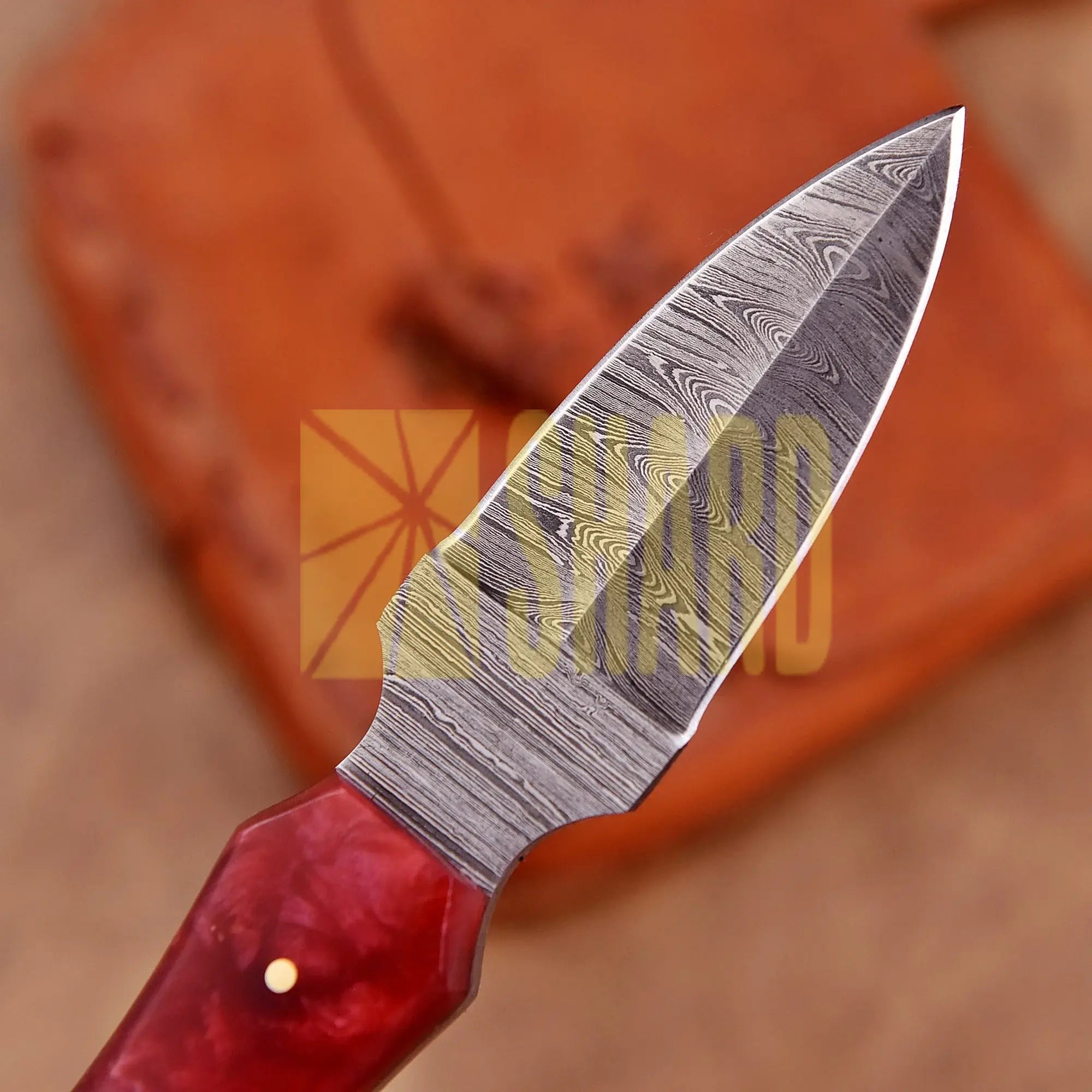 Hand-forged Damascus steel collectible with raindrop pattern and red ruby resin handle – Raindrop Trail gift piece