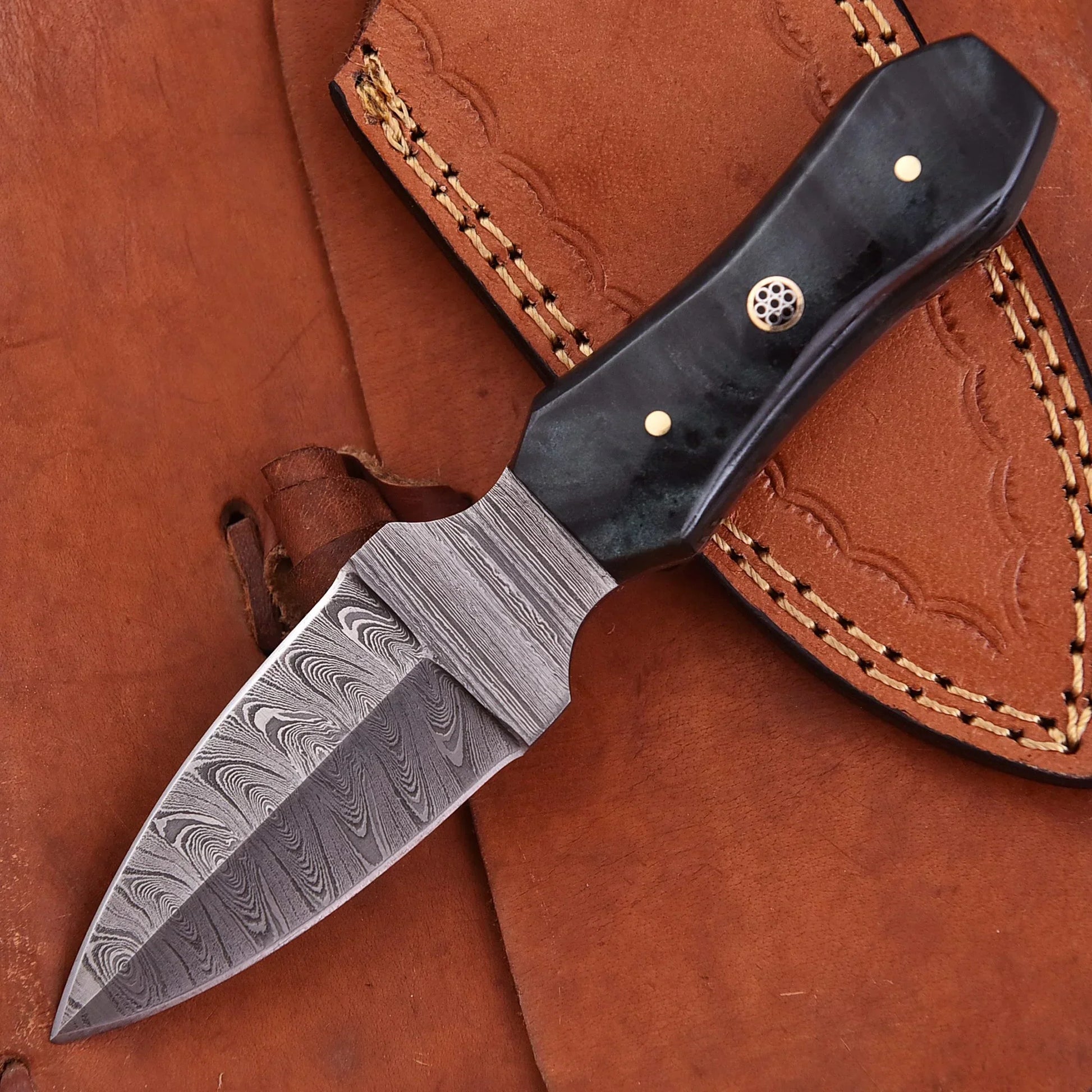 Hand-forged Damascus steel collectible with raindrop pattern and black resin handle – Raindrop Trail gift piece