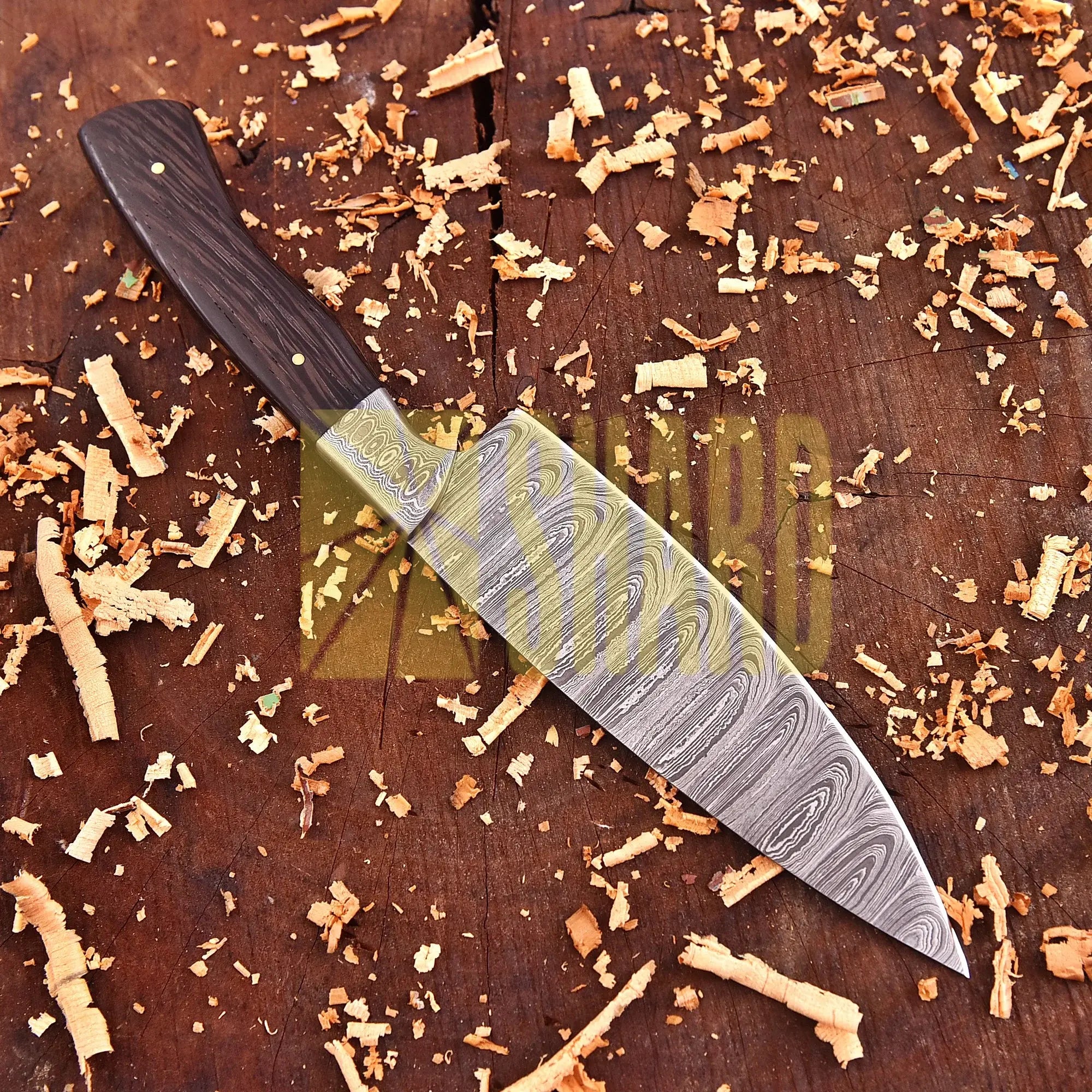 Hand-forged Damascus raindrop steel chef’s tool with rosewood handle – Emberleaf by Shard Blade